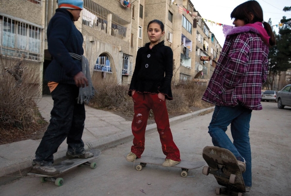 2009: Afghan children skateboarding near their homes. After decades of war, many Afghan youth badly need an option for recreation. (Paula Bronstein/Getty Images)