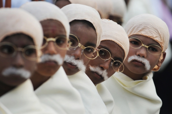 Children dressed as their country's founding father, Mahatma Gandhi, gather for a function in Kolkata, India on January 29, 2012. (Dibyangshu Sarkar/AFP/Getty Images)