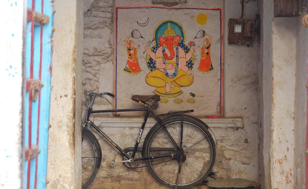 A painting of Lord Ganesha guards an entryway in Mumbai. (Angeline Thangaperakasam and Michael Newbill/Asia Society India Centre)