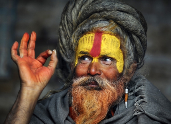 A Hindu Sadhu (holy man) poses for a photograph during the Maha Shivaratri festival at the Pashupatinath temple in Kathmandu, Nepal on February 27, 2014. Hindus mark the Maha Shivratri festival by offering special prayers and fasting to worship Lord Shiva, the lord of destruction. (Prakash Mathema/AFP/Getty Images)