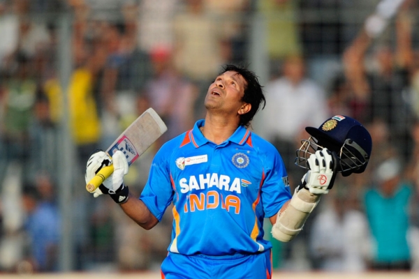 Tendulkar reacts after scoring his hundred century during the one-day international (ODI) Asia Cup cricket match between India and Bangladesh at the Sher-e-Bangla National Cricket Stadium in Dhaka on March 16, 2012. (Munir uz Zaman/AFP/Getty Images)