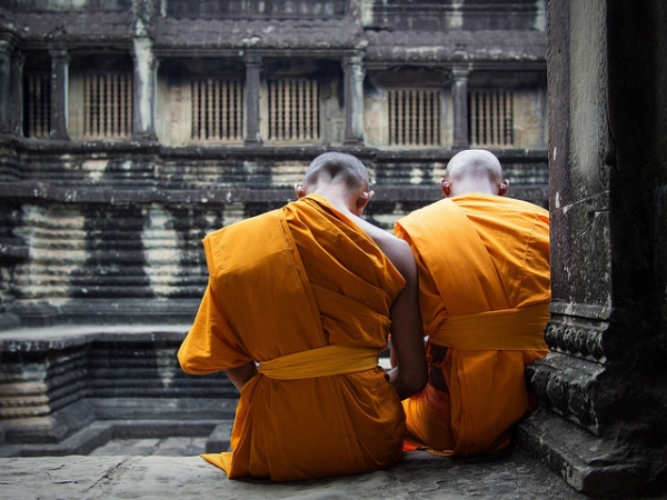 Buddhist monks catch up with the world on their smartphones in Siem Reap, Cambodia on May 1, 2015. (Arileu/Flickr)