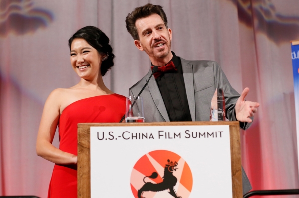 From left, emcees Kara Wang and Jeff Locker speak during the 2015 Asia Society U.S.-China Film Summit and Gala held at the Dorthy Chandler Pavilion on Thursday, November 5, 2015, in Los Angeles, Calif. (Ryan Miller/Capture Imaging)