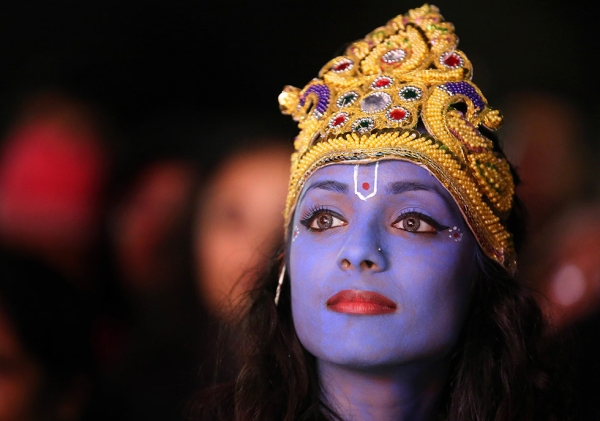 Dancer Vimi Solanki waits to perform on stage as Lord Krishna during the Hindu festival of Diwali on November 13, 2012 in Leicester, England. (Christopher Furlong/Getty Images)