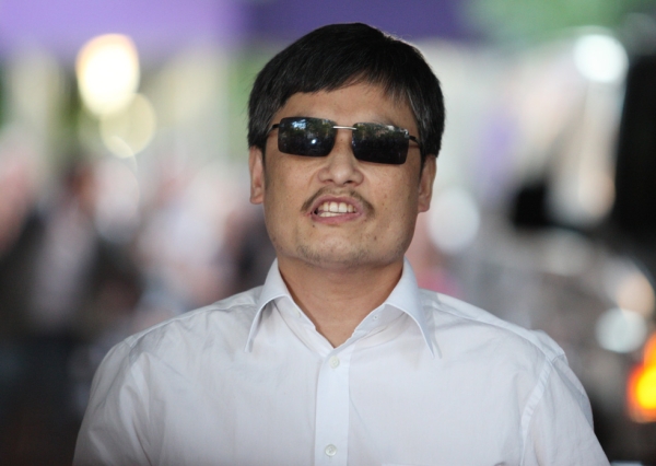 Blind Chinese activist Chen Guangcheng makes remarks to the media upon arriving on the campus of New York University on May 19, 2012 in New York City. (Andy Jacobsohn/Getty Images)