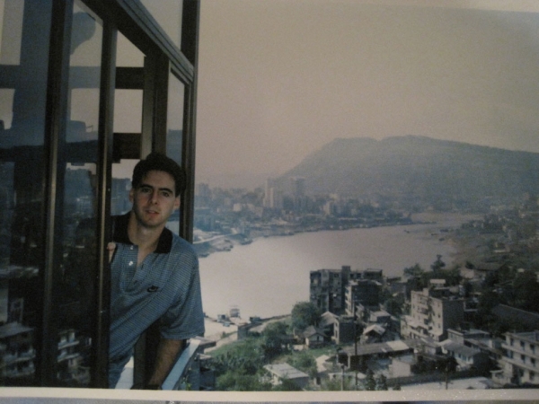 Peter Hessler in his apartment in Fuling, China, in the fall of 1996 shortly after he arrived. His apartment looked down to the Wu River and then the Yangtze in the distance. The main city of Fuling is visible to the left, at the juncture of the rivers.