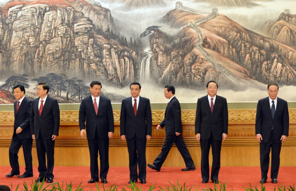 The new Politburo Standing Committee members (Xi Jinping, 3rd from left) meet the press at the Great Hall of the People in Beijing on November 15, 2012. (Mark Ralston/AFP/Getty Images)