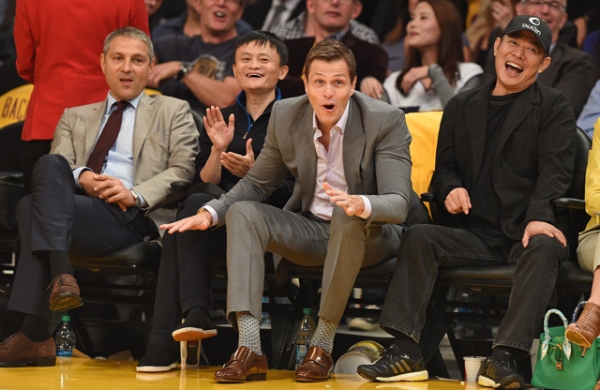 L to R: Talent agent Ari Emmanuel, Alibaba founder Jack Ma, talent agent Patrick Whitesell, and actor Jet Li attend the Los Angeles Lakers versus Houston Rockets NBA game at the Staples Center in Los Angeles on Oct. 28, 2014. (Robyn Beck/AFP/Getty Images)