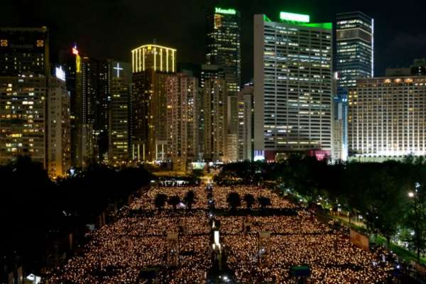 People take part in a candlelight vigil in Hong Kong on June 4, 2015, to mark the crackdown on the pro-democracy movement in Beijing's Tiananmen Square in 1989. (Dale de la Rey/AFP/Getty Images)