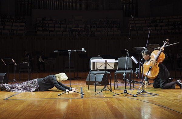 Meryl Streep and Yo-Yo Ma bow to eachother after a performance in Beijing on November 18, 2011. (Asia Society)