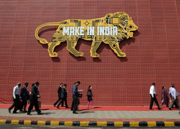 Visitors walk past one of the pavilions of the 'Make in India Week' in Mumbai on February 14, 2016. Over 190 companies, and 5,000 delegates from 60 countries, are taking part in the first 'Make in India' week held in Mumbai from February 13-18. (Indranil Mukherjee/AFP/Getty Images)