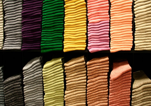 Stacks of colorful basics at Uniqlo. (Kiwi He/Flickr)