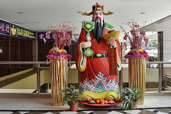 A figurine of the God of Wealth display at the Fu Lu Shou Complex in Singapore on January 29, 2013. (chooyutshing/flickr)