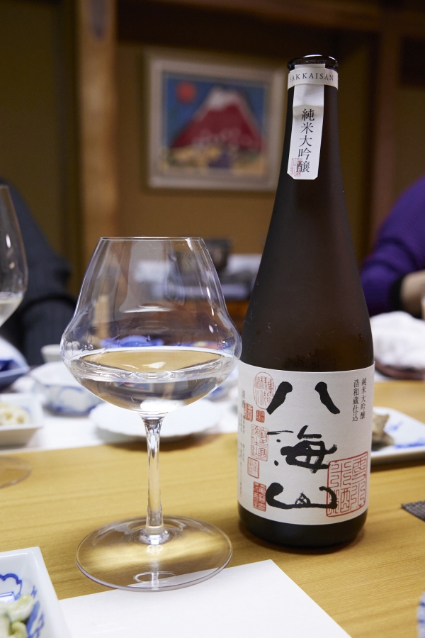 Hakkaisan sake bottle with a specially-made glass for sake