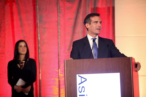 From right, Eric Garcetti, Los Angeles City Council, 13th District speaks by host journalist Lisa Ling during the Asia Society Southern California 2013 Annual Gala held at the Millennium Biltmore Hotel on Tuesday, February 19, 2013 in Los Angeles, Calif. (Photo by Ryan Miller/Capture Imaging)