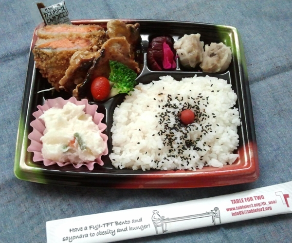 Ideally, a Table for Two bento box like the one shown here will help you say "sayonara" to obesity and hunger. (Table for Two)