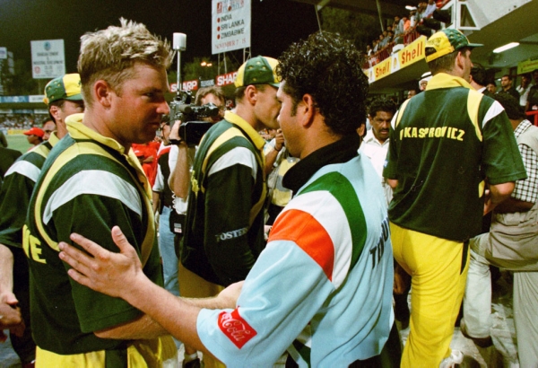 Tendulkar (C) shakes hands with Australian cricketers after the Indian victory against Australia in a final match in Sharjah on April 24, 1998. (Rabih Moghrabi/AFP/Getty Images)