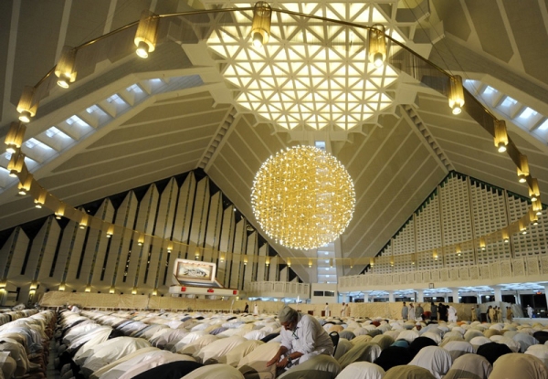 Pakistani Muslim worshippers offer Lailat al-Qader prayer at the Grand Faisal Mosque in Islamabad in 2009. Lailat al-Qader, (Night of Power), on which the holy Koran was first revealed to the Prophet Muhammad, falls on the 27th night of Ramadan. (Aamir Qureshi/AFP/Getty Images)