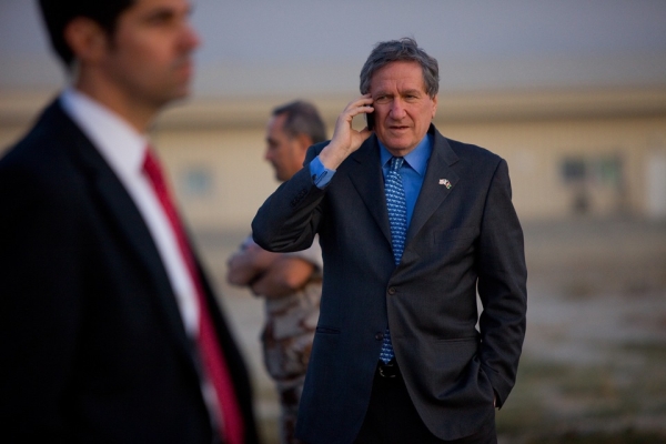 Holbrooke&apos;s last public assignment was to bring stability to Afghanistan and Pakistan as US Special Envoy to those nations. Here he speaks on the phone at a Kabul airfield prior to the arrival of Secretary of State Hillary Clinton on Nov. 18, 2009, when she was making her first trip to Afghanistan as US Secretary of State. (Paula Bronstein /Getty Images)