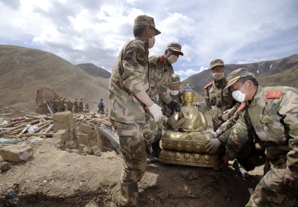 Rescuers removed a Buddha statue from a destroyed Tibetan monastery in Jiegu, in China&apos;s remote Yushu county, on Apr. 20. The Yushu earthquake struck on Apr. 14, killing thousands and registering a magnitude of 6.9. (STR/AFP/Getty Images)