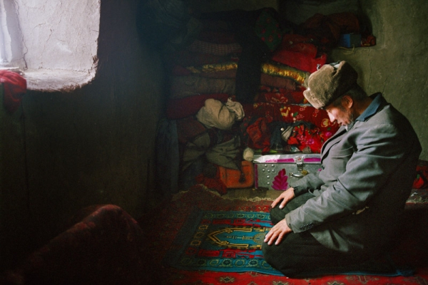 Afghan Kyrgyz are Sunni Muslim. With no mosques in this extremely remote part of the world, daily prayers take place at home. (Matthieu Paley)