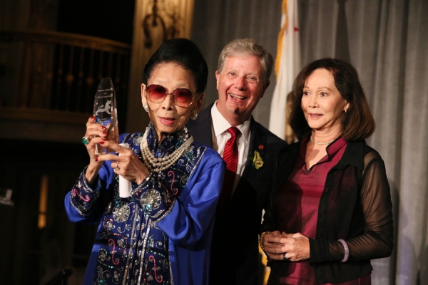 From left, Madame Sylvia Wu, Restauranteur is awarded the Culinary Legacy Award by Thomas E. McLain, Chair, Asia Society of Southern California and presenter actress Nancy Kwan during the Asia Society Southern California 2014 Annual Gala held at the Millennium Biltmore Hotel on Monday, May 19, 2014, in Los Angeles, Calif. (Photo by Ryan Miller/Capture Imaging)