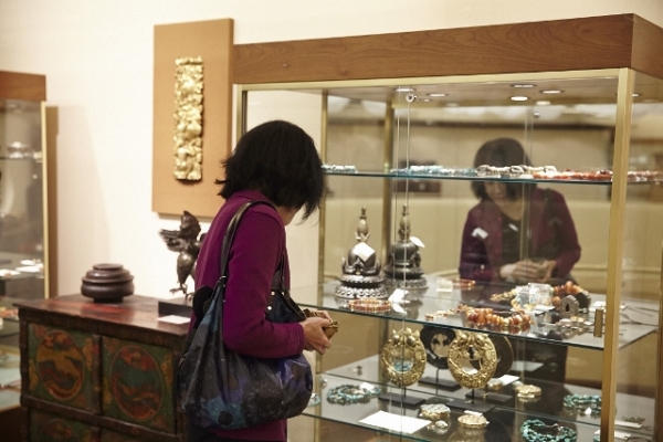 ASNC Member Barbara Koh peruses Xanadu's Tibetan jewelry selection