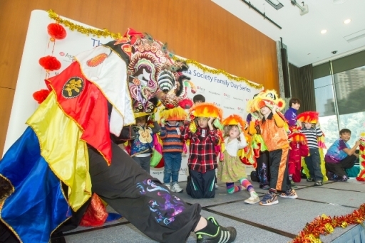 Children watched intently and learned the Unicorn Dance from the masters at the Morgan Stanley-Asia Society Chinese New Year Family Day.