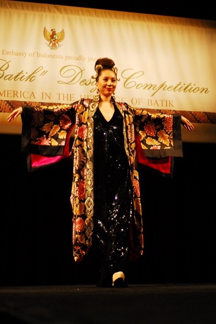 Wirawan&apos;s creations encompass everything from cocktail dresses to blouses, jackets, and more extravagant creations like the robe seen here.