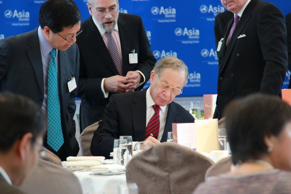 Frank Newman signs copies of his new book at Asia Society Hong Kong Center on April 12, 2012. (Asia Society Hong Kong Center)
