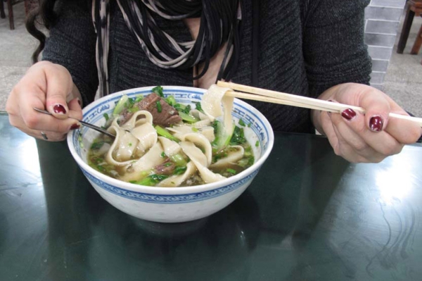 Sliced boiled lamb hand-ripped soup noodles from Xi’an, China. (Julia Dorff)