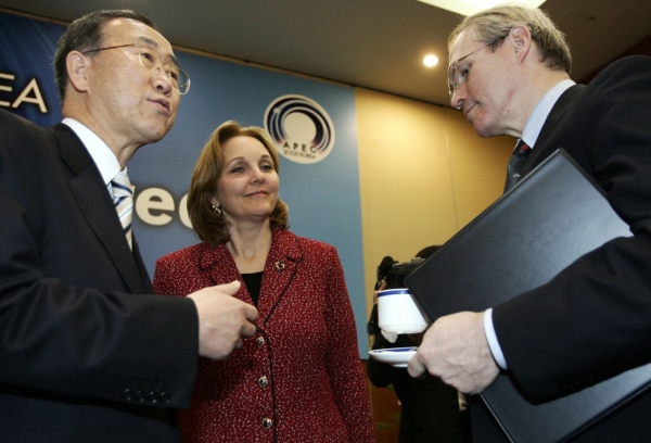 South Korean Foreign Minister Ban Ki-Moon (L) talks with U.S. Assistant Secretary of State Christopher Hill (R) as Undersecretary of State Josette Sheeran (C) listens at an Asia Pacific Economic Cooperation (APEC) ministerial meeting in Busan on November 15, 2005. (Toru Yamanaka/AFP/Getty Images)