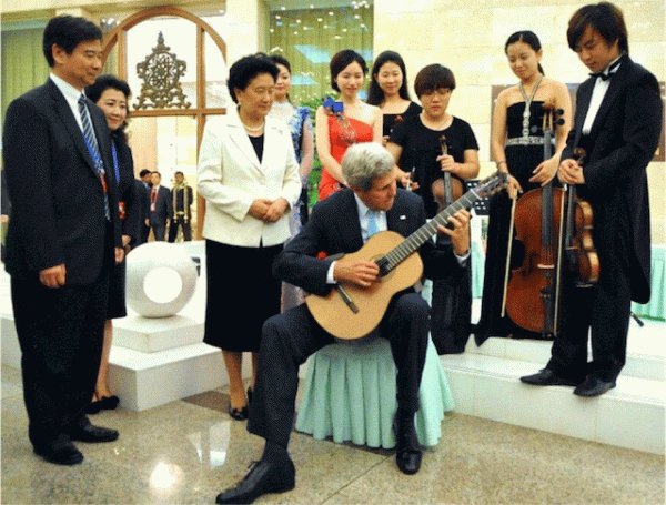 "Guitar skills a little rusty, but couldn't turn down Vice Premier Liu Yandong's invitation to join in at Great Hall!" — @JohnKerry/Twitter