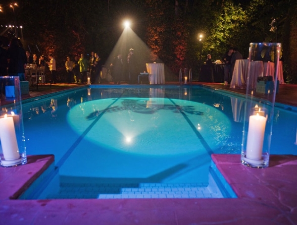 Asia Society&apos;s distinctive leogryph logo was projected onto the pool at the Korean Consul General&apos;s residence. (Luminaire Images)