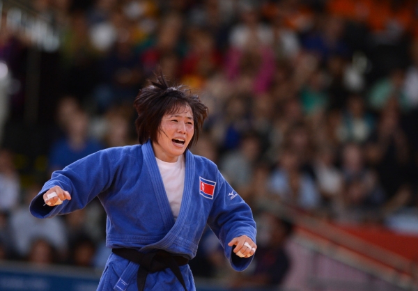 GOLD: North Korea's An Kum Ae celebrates after winning the Women's 52kg Judo contest final match of the judo event on July 29, 2012 . (Johannes Eisele/AFP/GettyImages)