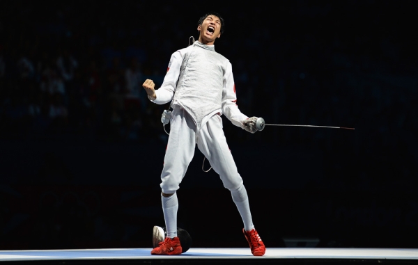 GOLD: China's Sheng Lei celebrates winning the men's foil individual gold medal on July 31, 2012. (Lars Baron/Getty Images)