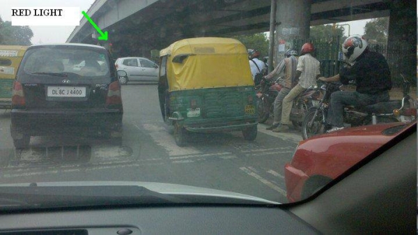 Resident-submitted photo of a vehicle running a red light in Delhi. (Gagan Gupta/Facebook)