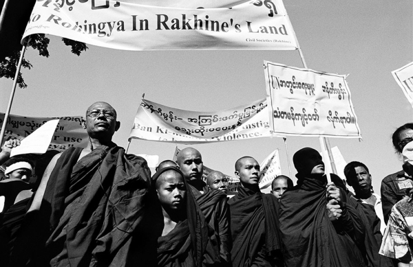 Several thousand people from the Buddhist Rakhine community demonstrate in the streets of Stittwe, Myanmar against the Rohingya minority group. They also protest the UN secretary general using the word 'Rohingya' in a recent speech. (Greg Constantine)