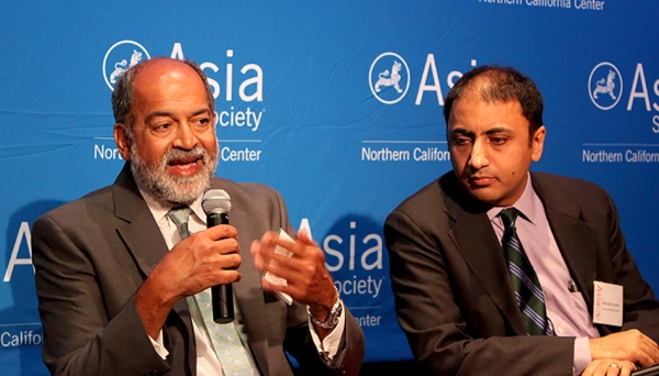 Zainulbhai and Dhume speaking at the panel discussion