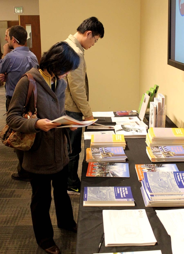 Attendees at the event browsing Asia Society materials (Asia Society)