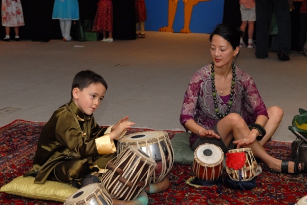 Young guests had an opportunity to learn to play the tabla. (Elsa Ruiz/Asia Society)