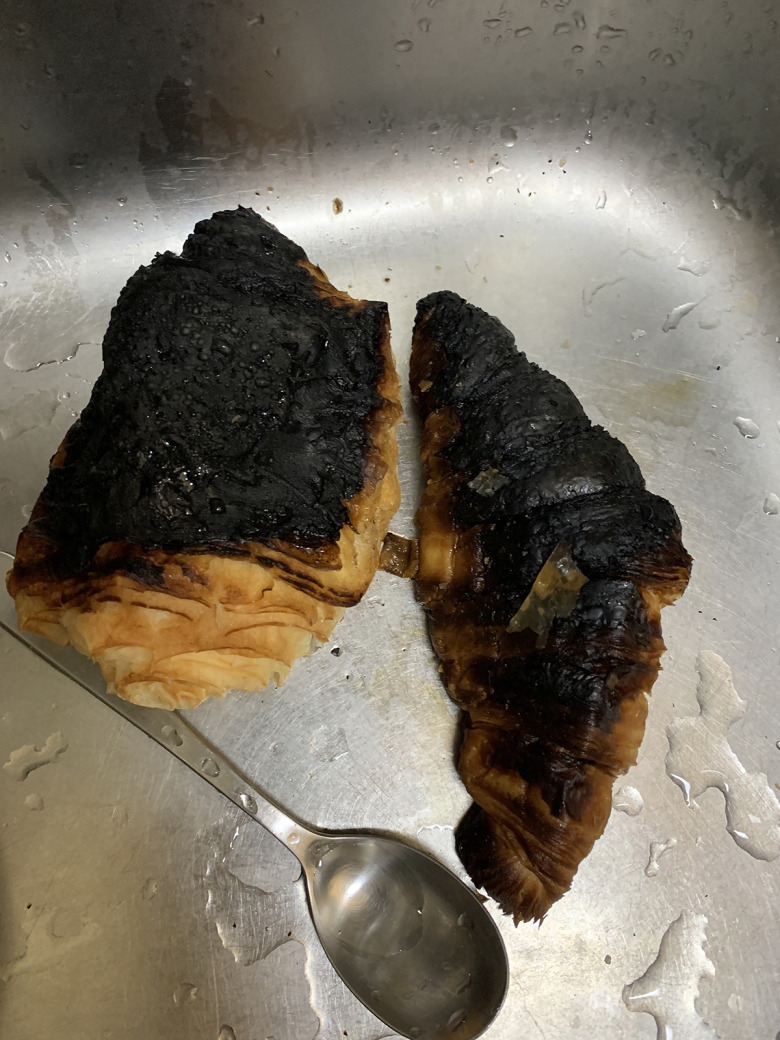 Photograph of a burnt croissant