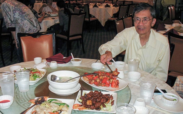 Chinese food critic David Chan doing what he loves most. (Eric Chan)