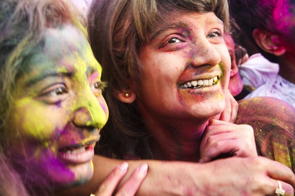 Indian girls covered with color (Photo Credit: Veejay Calutan)